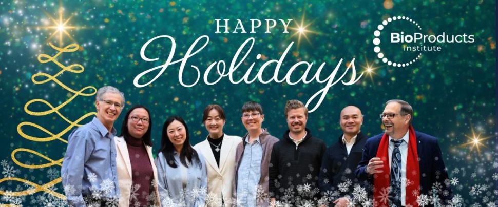 BPI team against a green holiday background and tree with Happy Holidays overlaid 